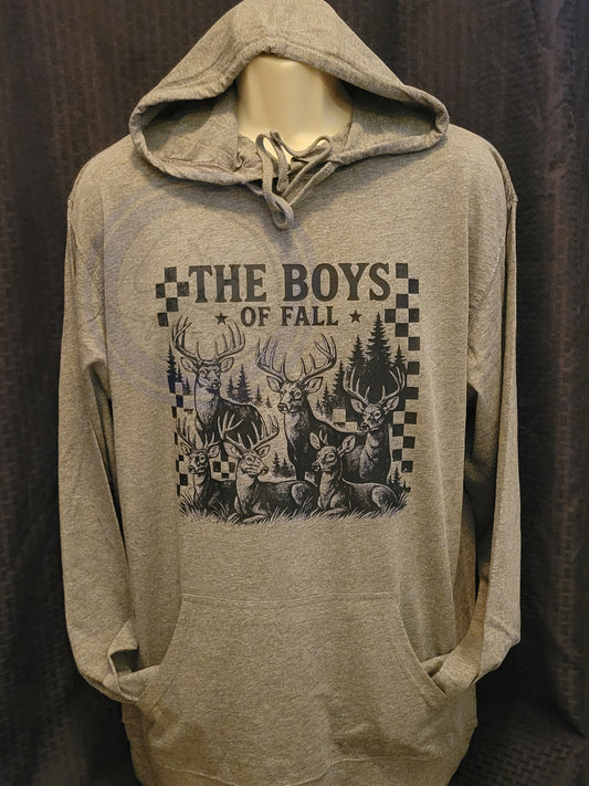 Gray hoodie with 'The Boys of Fall' graphic design on a dark background